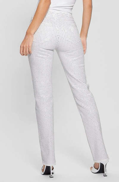 Shop Guess 1981 Embellished Straight Leg Jeans In White