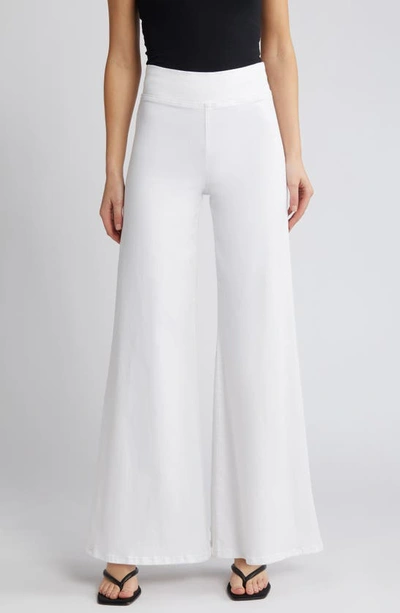 Shop Frame Jetset Wide Leg Flare Pull-on Jeans In White