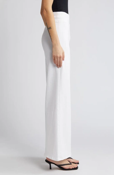 Shop Frame Jetset Wide Leg Flare Pull-on Jeans In White