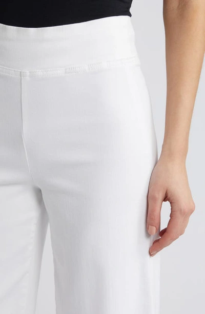 Shop Frame Jetset Wide Leg Flare Pull-on Jeans In White