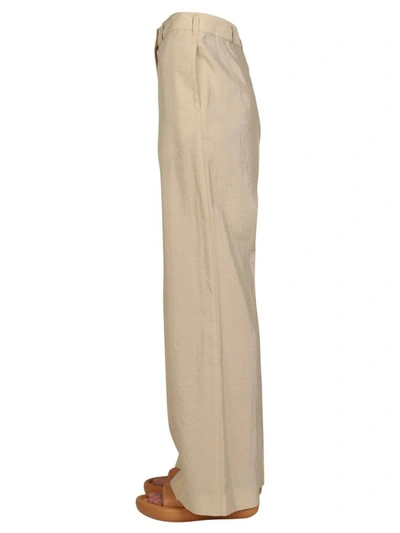 Shop Lemaire Wide Leg Pants In Beige