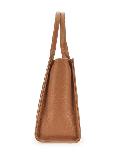 Shop Marc Jacobs The Tote Large Bag In Brown