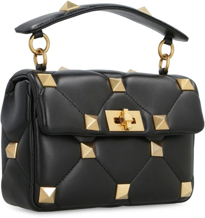 Shop Valentino Garavani - Roman Stud Quilted Leather Bag In Black