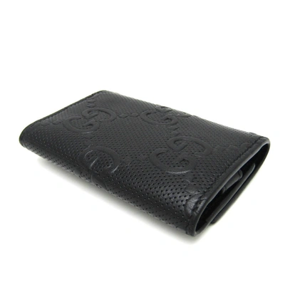 Shop Gucci Gg Embossé Black Leather Wallet  ()