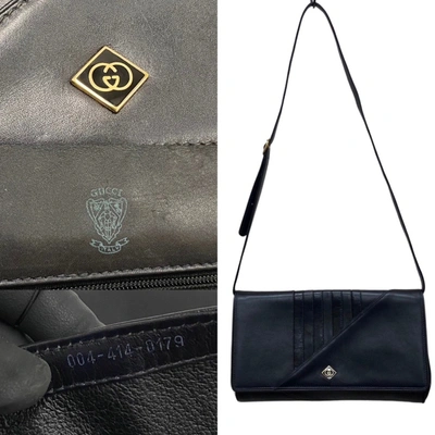 Shop Gucci Interlocking G Black Leather Clutch Bag ()