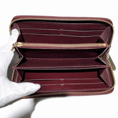 LOUIS VUITTON Pre-owned Zippy Red Patent Leather Wallet  ()