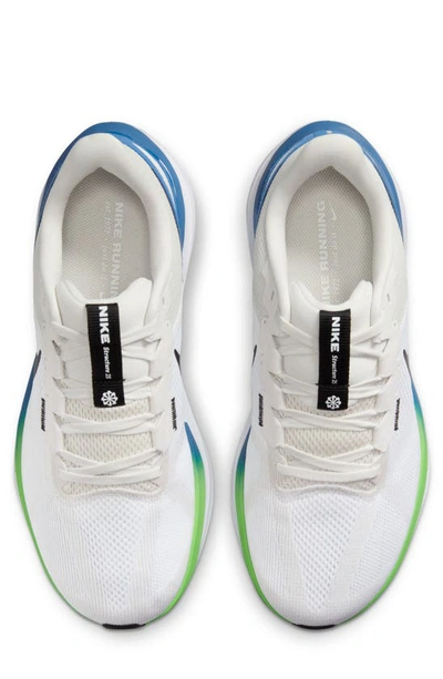 Shop Nike Air Zoom Structure 25 Running Shoe In White/ Black/ Platinum/ Blue