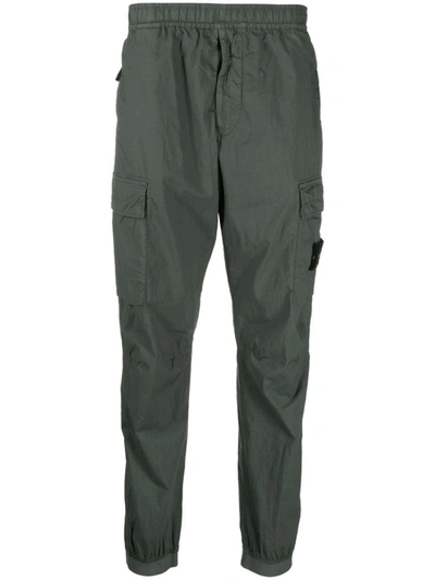 Shop Stone Island Regular Fit Cargo Pants In Light Stretch Cotton Tela In Green