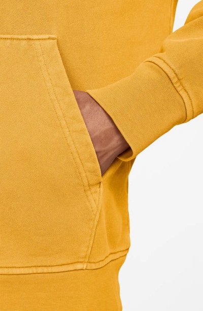 Shop Jordan Flight Essentials Washed Fleece Cotton Hoodie In Yellow Ochre
