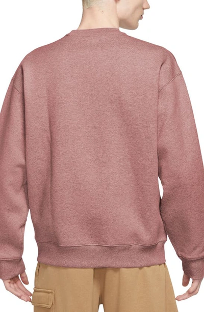 Shop Nike Solo Swoosh Oversize Crewneck Sweatshirt In Red Stardust/ White