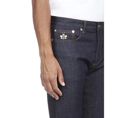 Shop Dior Homme X Kaws Bee Logo Jeans