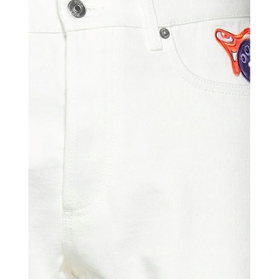 Shop Dior Kenny Scharf Patches Jeans