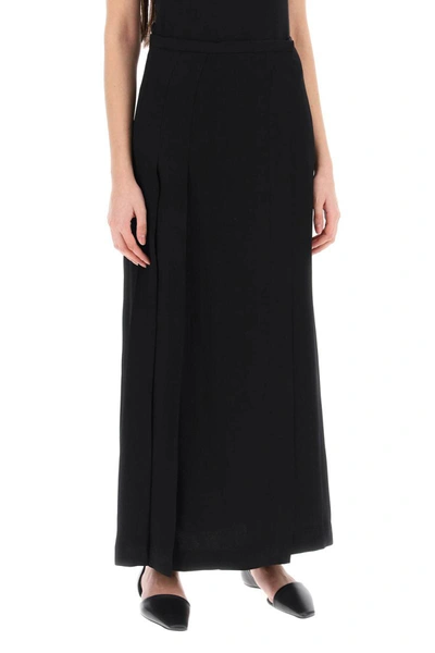 Shop Totême Toteme Maxi Wrap Skirt With Pockets In Black