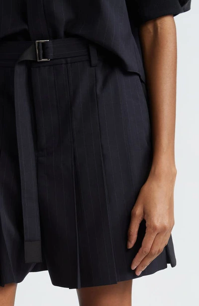 Shop Sacai Pinstripe Belted Pleated Shorts In Navy