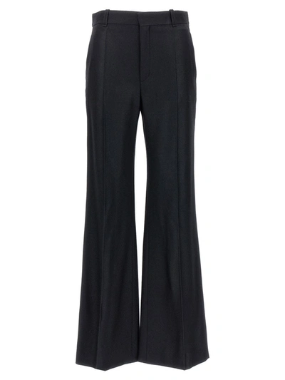 Shop Chloé Wool And Silk Blend Flared Leg Trousers In Black