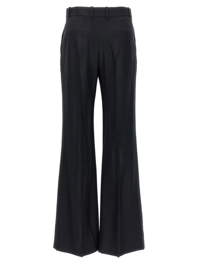 Shop Chloé Wool And Silk Blend Flared Leg Trousers In Black