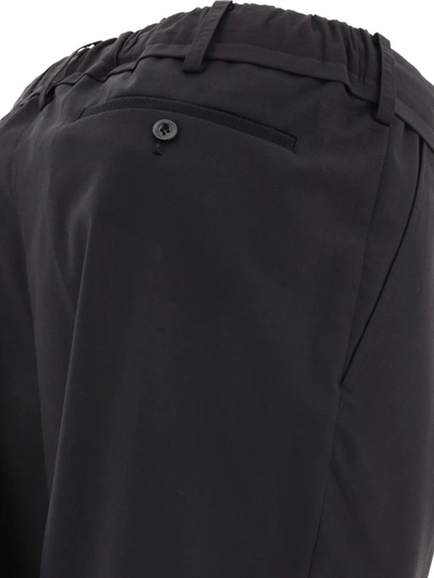 Shop Sacai Tapered Drawstring Trousers In Black
