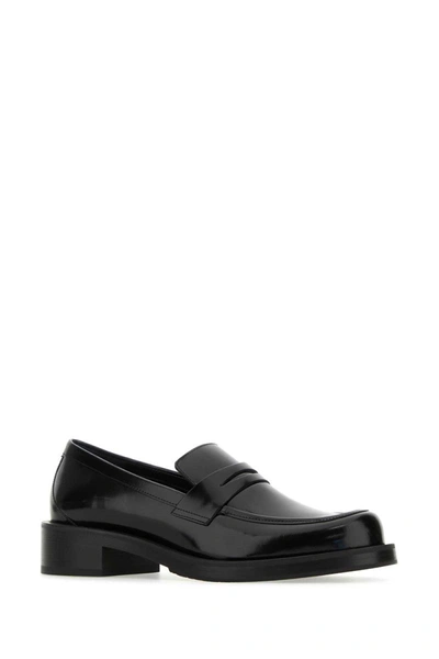 Shop Stuart Weitzman Black Shiny Leather Loafers