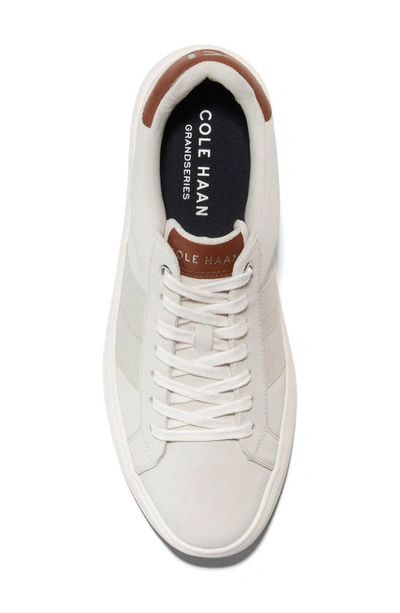 Shop Cole Haan Grand Crosscourt Premier Sneaker In Ivory/ White/ British Tan
