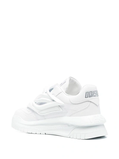 Shop Versace Sneakers In White