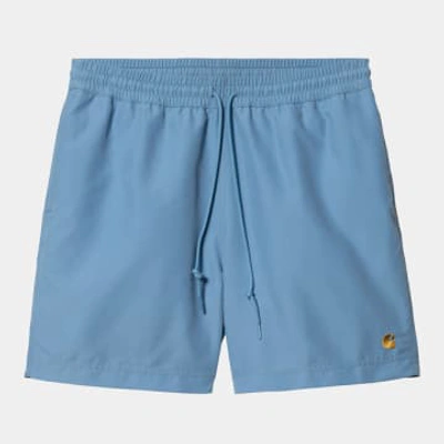 Shop Carhartt Wip Chase Swim Trunks In Gold