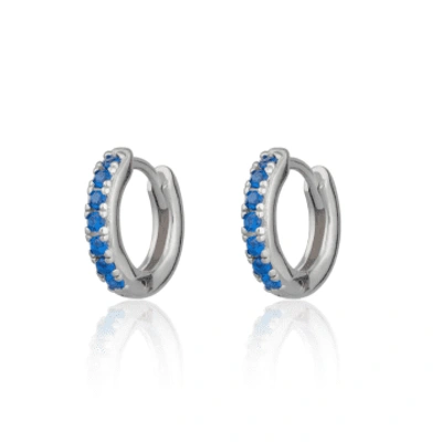 Shop Scream Pretty Huggie Earrings With Blue Stones In Metallic