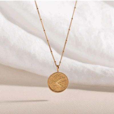 Shop Claire Hill Designs "kind" Shorthand Coin Necklace In Metallic