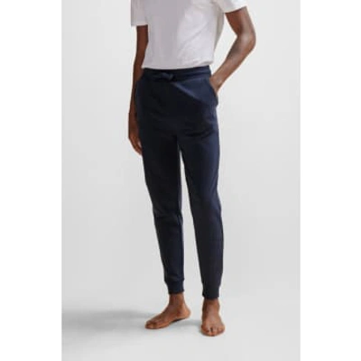 Shop Hugo Boss Dark Blue Cotton Terry Tracksuit Bottoms With Embroidered Logo 50511055 403