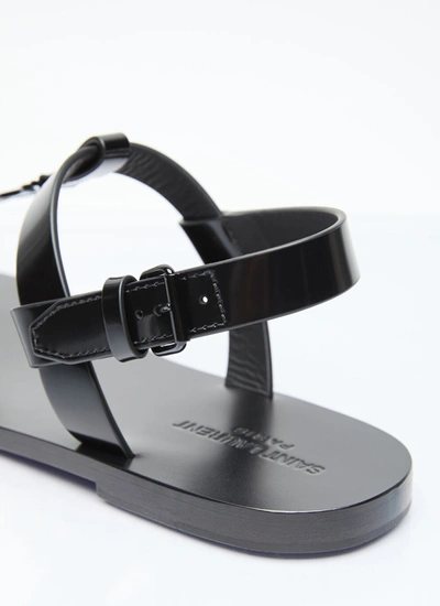 Shop Saint Laurent Men Cassandre Sandals In Black