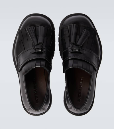 Shop Bottega Veneta Haddock Fringed Leather Loafers In Black