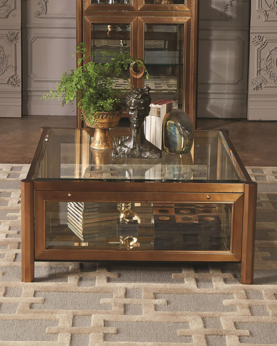 Shop Global Views Apothecary Glass Top Coffee Table In Gold