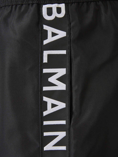 Shop Balmain Logo Boxer Swimsuit In Negre