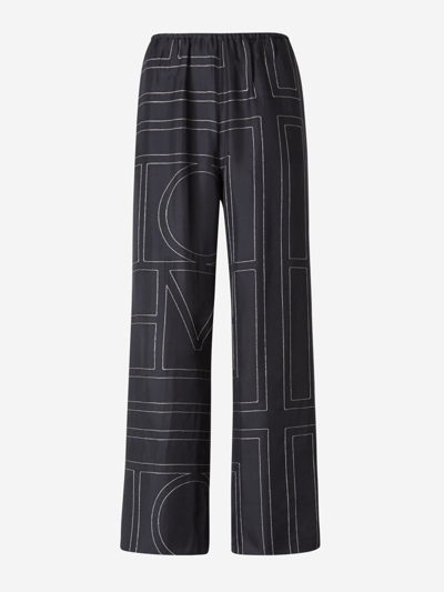 Shop Totême Silk Monogram Pajama Pants In Negre