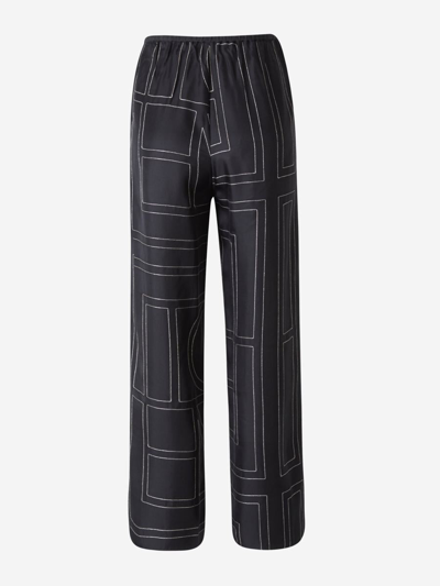 Shop Totême Silk Monogram Pajama Pants In Negre