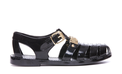 Shop Moschino Jelly Sandals With Lettering Logo In Black
