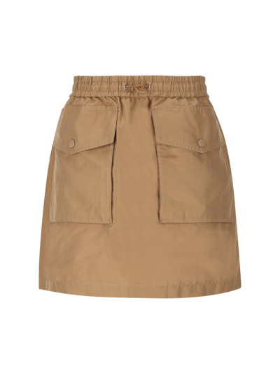 Shop Moncler Logo Patch Drawstring Skirt In Beige