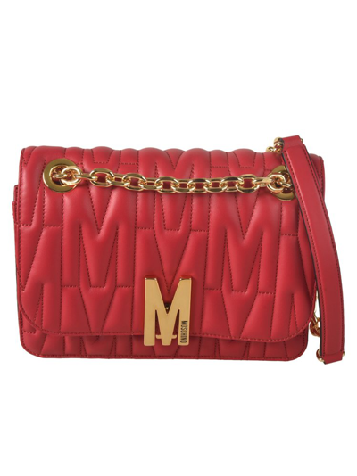 Shop Moschino Logo Plaque Quilted Shoulder Bag In Red