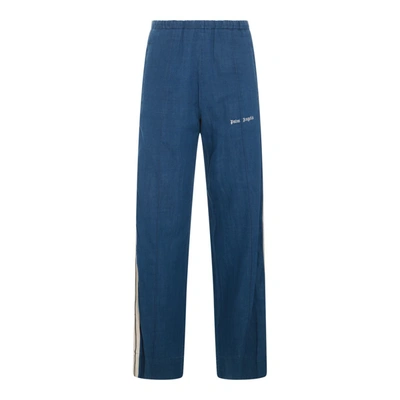 Shop Palm Angels Trousers In Indigo Blue