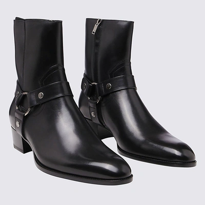 Shop Saint Laurent Black Leather Wyatt Harness Boots