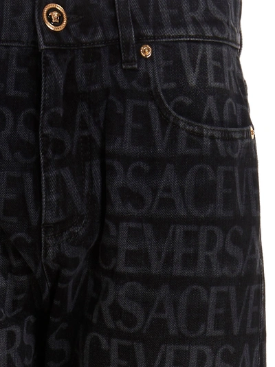 Shop Versace Logo Print Jeans Black
