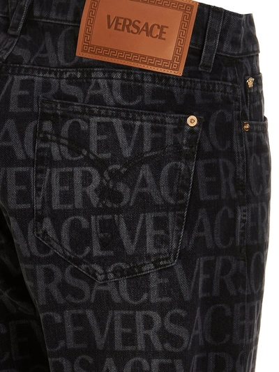 Shop Versace Logo Print Jeans Black