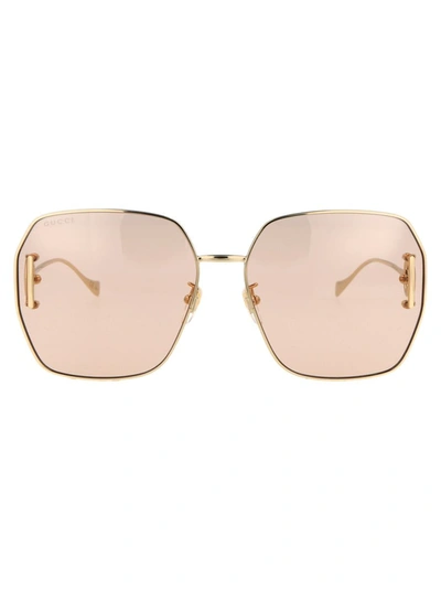 Shop Gucci Sunglasses In 001 Gold Gold Brown