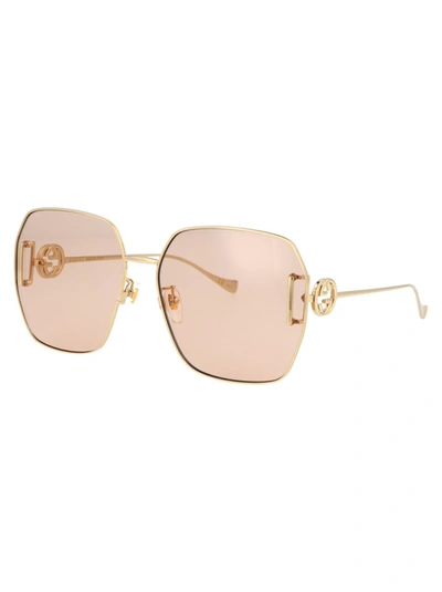 Shop Gucci Sunglasses In 001 Gold Gold Brown