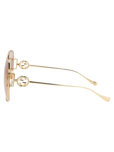 Shop Gucci Sunglasses In 001 Gold Gold Brown
