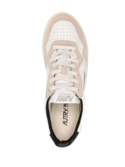 Shop Autry Medalist Sneakers In White/black