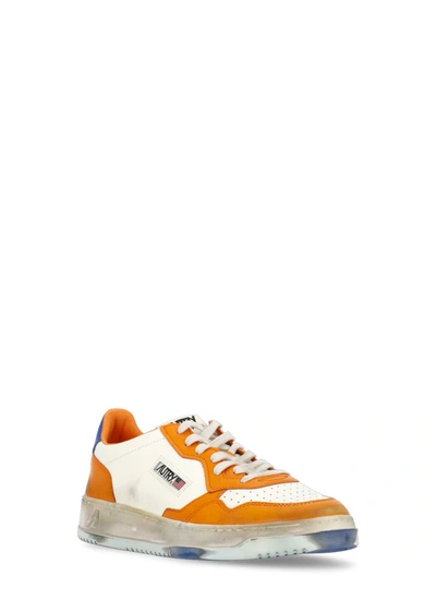 Shop Autry Sneakers In Orange