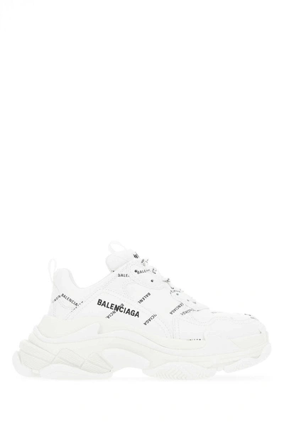 Shop Balenciaga Triple S Sneakers In 9010