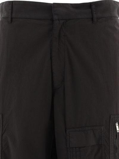 Shop Givenchy Poplin Trousers With Multi Zipped Pockets In Black