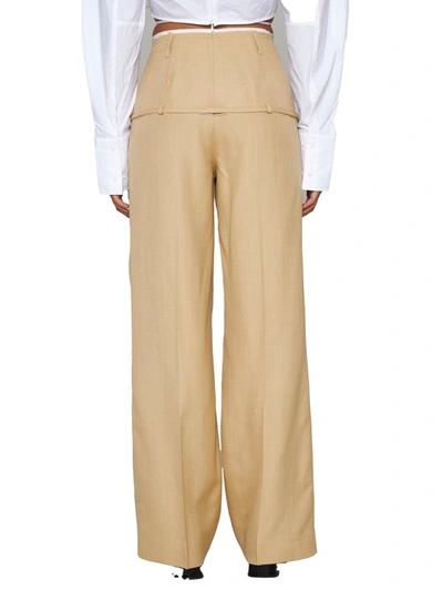 Shop Jacquemus Trousers In Beige