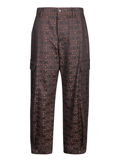 Shop Moschino Trousers In Brown